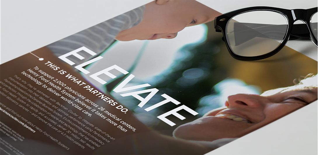 A copy of a Beckman Coulter ad with a pair of reading glasses beside it