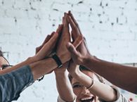 Group high fiving