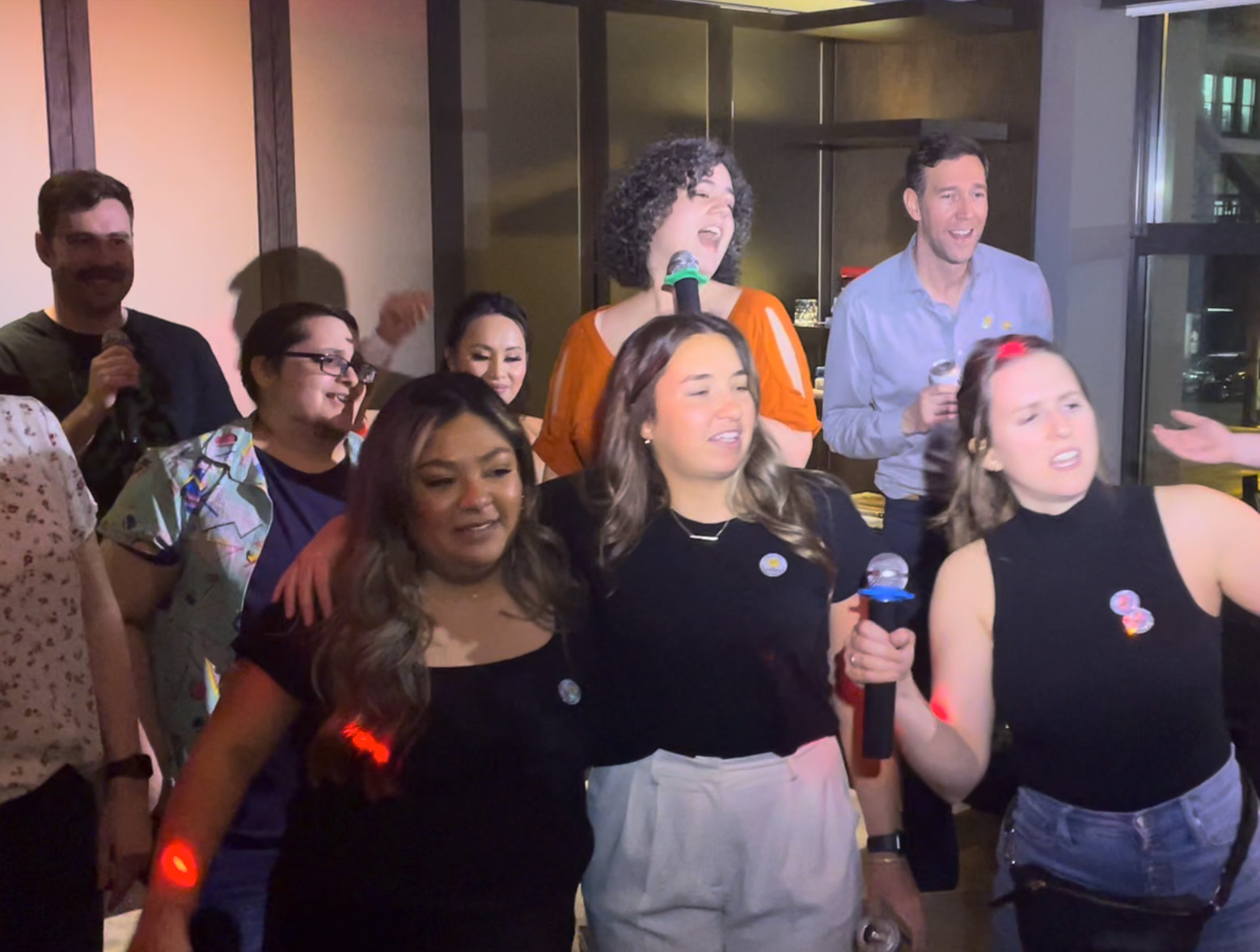 A group of HDMZers singing karaoke at the Virgin Hotel Chicago.