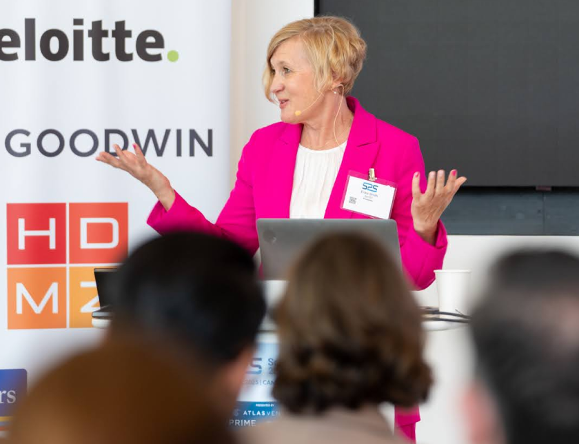 Person speaking at a conference