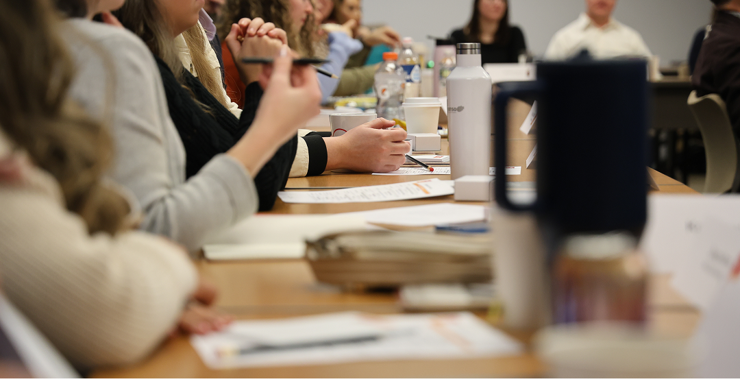 team sitting during a meeting
