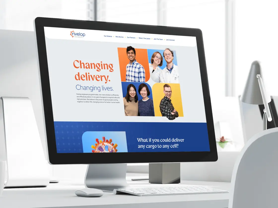 A computer monitor displays the Nvelop website with the text "Changing delivery. Changing lives." and images of diverse people.